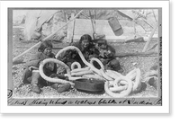 Historic Framed Print, Eskimos shading behind a walrus blubber at Indian Point,  17-7/8" x 21-7/8"