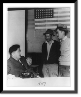Historic Framed Print, Los Angeles, Calif. - curfew - Fred Tayama, chairperson of the Southern District Council of the Japanese American Citizens League explaining curfew and travel laws to two fellow Japanese,  17-7/8" x 21-7/8"