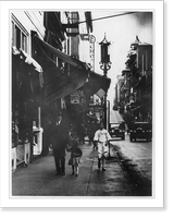 Historic Framed Print, [Chinese in Chinatown, San Francisco, on street: Man, woman, and child walking toward camera],  17-7/8" x 21-7/8"