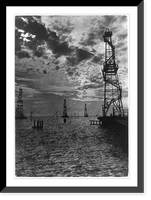 Historic Framed Print, [Four oil derricks in water, Baku, Azerbijan Soviet Socialistic Republic],  17-7/8" x 21-7/8"