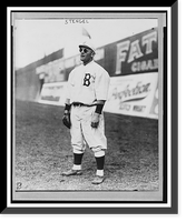 Historic Framed Print, [Casey Stengel, full-length portrait, standing, facing left, wearing sunglasses, while playing outfield for the Brooklyn Dodgers],  17-7/8" x 21-7/8"