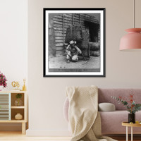 Historic Framed Print, A coolie re-adjusting his pack, Korea,  17-7/8" x 21-7/8"