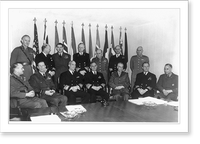 4 NATO military leaders posed around conference table; 12 flags in background, Antique Poster