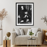Historic Framed Print, Grand opera by radio inaugurated as regular program of Chicago company. Mary Garden. listening as Miss Edith Mason,. sings into the radio transmitter for the first regular radio program of operas,  17-7/8" x 21-7/8"