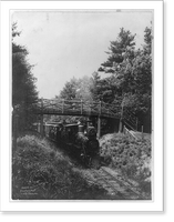 Historic Framed Print, [Railroad train passing under bridge, with the locomotive in foregrd., near Lebanon, Pa. (?),  17-7/8" x 21-7/8"