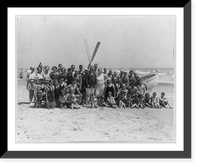 Group of people in front of lifeboat on beach, Avalon, N.J, Antique Print
