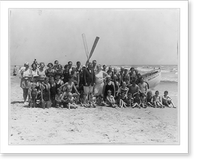 Group of people in front of lifeboat on beach, Avalon, N.J, Antique Print