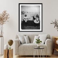 Dog, boy and girl seated on sea wall, Vintage Wall Art