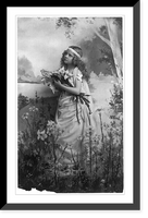 Historic Framed Print, [Girl holding lilies(?) and looking up],  17-7/8" x 21-7/8"