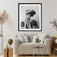 Young woman modeling: Half lgth., 2 long pieces of material draped from hat over body, Antique Wall Art