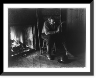 Adirondack Mountains, N.Y.: Absorbed - man reading by fireplace, Historic Print