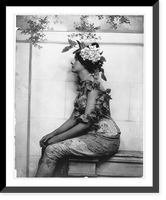 Woman posed, three-quarter length, seated, left profile, with vine draped over head and shoulder, Historic Reproduction