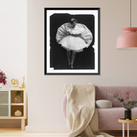 Woman posed, full-length, standing, facing front, wearing ballet costume, with back of skirt raised behind her, Vintage Print