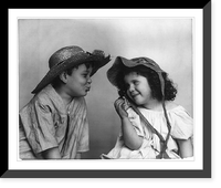 Historic Framed Print, [Boy wearing broken straw hat, with lips puckered, facing girl wearing bonnet],  17-7/8" x 21-7/8"