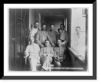Group of 7 Signal Corps members posed in hallway and 2 Filipinos in background, Philippine Islands, 1899, Historic Print