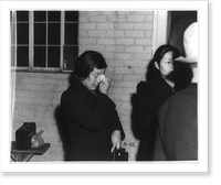 Los Angeles (Calif.) evacuation . Japanese woman bids temporary good-bye to her husband as he leaves for Manzanar Reception Center as one of an advance party of technicians, March 21, 1942 Antique