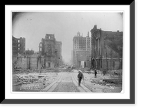 Ruins after San Francisco earthquake; man on crutches walking along trolley tracks in foregrd, Vintage Wall Art