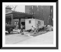 Model of Wingfoot prefabricated home manufactured by Goodyear in front of Goodyear service station, Washington, D.C. Classic, Historic Reproduction