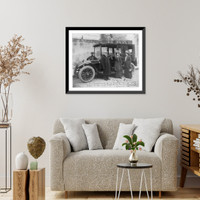 Historic Framed Print, [The Infanta Eulalia of Spain, Mr. and Mrs. Batcheller, and the chauffeur, Adolfo Fusi, standing by automobile, at the beginning of a long journey across Spain],  17-7/8" x 21-7/8"