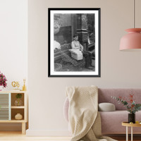 Historic Framed Print, An Enforced Rest. Harry Swope, aged 15, 426 Elm St., Newport, Ky., Carrying heavy bundles of paper for a News & Sta'y Co. Location: Newport, Kentucky.,  17-7/8" x 21-7/8"