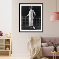 Woman modeling clothing: Sky-blue flannel piped with white makes up this one-piece dress from Davidow Sons, Vintage Poster