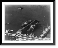 Aerial views of San Diego, California: municipal docks showing transports with troops, Antique Poster