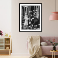 Two women helping children board train, Antique Print