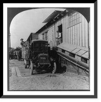 Truck unloading oranges at receiving station. Fruit automatically conveyed to washer, Redlands, Calif. Classic, Vintage Poster