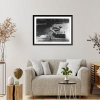 Historic Framed Print, Helen Keller, half. lgth., seated in boat, left profile; feeding swan,  17-7/8" x 21-7/8"