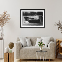 Historic Framed Print, Helen Keller, half lgth., seated in boat, left profile; feeding swan,  17-7/8" x 21-7/8"