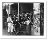 Pan-American Exposition, Buffalo, N.Y., 1901: Man in wheeled chair at souvenir shop with 4 other persons, Historic Print