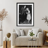 Ronald Reagan with Jane Wyman holding bowling ball on bowling alley; scene from Brother Rat, Historic Print