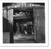 Andrew Scavnicky and his buddy, John Mikula, coal miners, loafing in Andrew's workshop, with dog, Hazelton, Pa.: View from exterior, Antique Wall Art