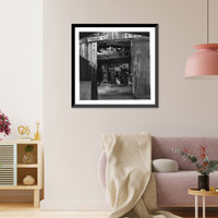 Andrew Scavnicky and his buddy, John Mikula, coal miners, loafing in Andrew's workshop, with dog, Hazelton, Pa.: View from exterior, Antique Wall Art