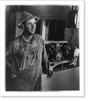 Portrait of America. No. 36. Rural electrification in the U.S. Installation of electrical refrigeration on an American farm through the motor and equipment shown in this picture enables U.S. Vintag