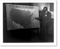 Carl R. Johnson pointing to a map of the U.S. showing locations of NAACP branches Classic, Vintage Poster