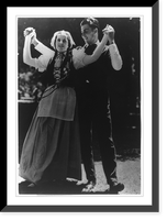 Man and woman of the Acadian country in America, in native attire, doing dance of French origin at the Americn National Folk Festival, Philadelphia, Antique Poster