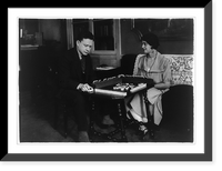 Historic Framed Print, Alma Gluck and her husband playing game (scrabble?), March 4, 1924?,  17-7/8" x 21-7/8"