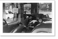 U.S. Customs and Immigrations officers searching the trunk of automobile for illegal drugs, Vintage Print