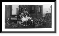 Hamilton Family, sardine works, Eastport. Father earns $15 to $25 a week irregularly during the work season for three months. Said that 20 years ago he made $5 a day as a boy, cutting. Classic Wall