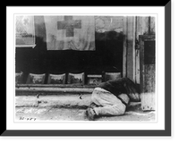 Russian man collapsed from typhus under window with Red Cross banner, at building where care could be given him, Siberia, Antique Wall Art