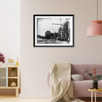 Historic Framed Print, [Column being raised into position, U.S. Post Office, with building named Agency Block" in background]",  17-7/8" x 21-7/8"
