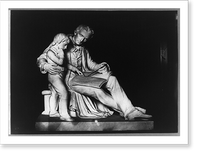 Historic Framed Print, [Sculpture of man and boy reading book],  17-7/8" x 21-7/8"