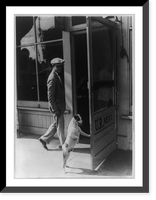 Tippy, tonsorial terrier, renders swift service to incoming patrons of shop, Historic Print