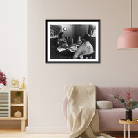 Greenbelt, Md.: Man, woman and girl at dinner table and man standing in doorway, Vintage Poster