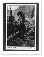 Historic Framed Print, [Boulder City, Nevada. Workman with water-bag, during construction of Boulder Dam],  17-7/8" x 21-7/8"