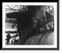 Commander Patrick J. Hannifin, prospective blue Commanding Officer is to left of Commander Lando W. Zech, Jr., prospective gold Commanding Officer on deck of Polaris submarine U.S.S. Lafayette An