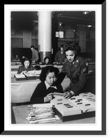Central Mail Directory Room in the 7th Base Post Office, where WAC Sgt. Sara Polio from Hazelhurst, Penn. checks on the progress of a Japanese employee, Yokohama Classic, Vintage Print