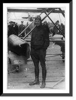Jimmy Doolittle, full-length portrait, standing, facing left, in flying clothing, by his record-breaking airplane, Vintage Poster