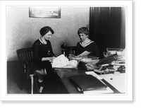 Florence Kling Harding, half-length portrait, seated at desk with another woman, facing left Classic, Vintage Poster